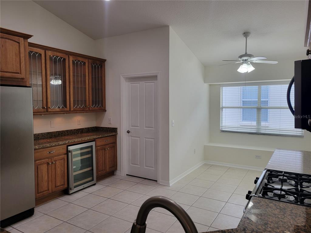 2011 Cattleman Drive Brandon, FL 33511 - Photo 23 of 40 a kitchen with stainless steel appliances granite countertop a stove and a sink