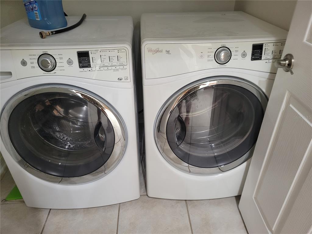 2011 Cattleman Drive Brandon, FL 33511 - Photo 25 of 40 a utility room with dryer and washer