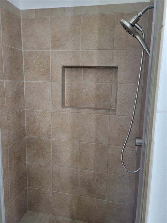 2011 Cattleman Drive Brandon, FL 33511 - Photo 27 of 40 a bathroom with a glass shower door