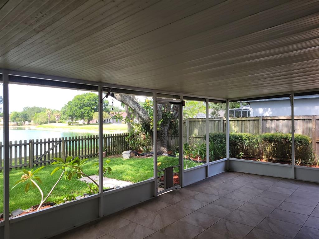 2011 Cattleman Drive Brandon, FL 33511 - Photo 36 of 40 a view of a yard with porch and mountain view