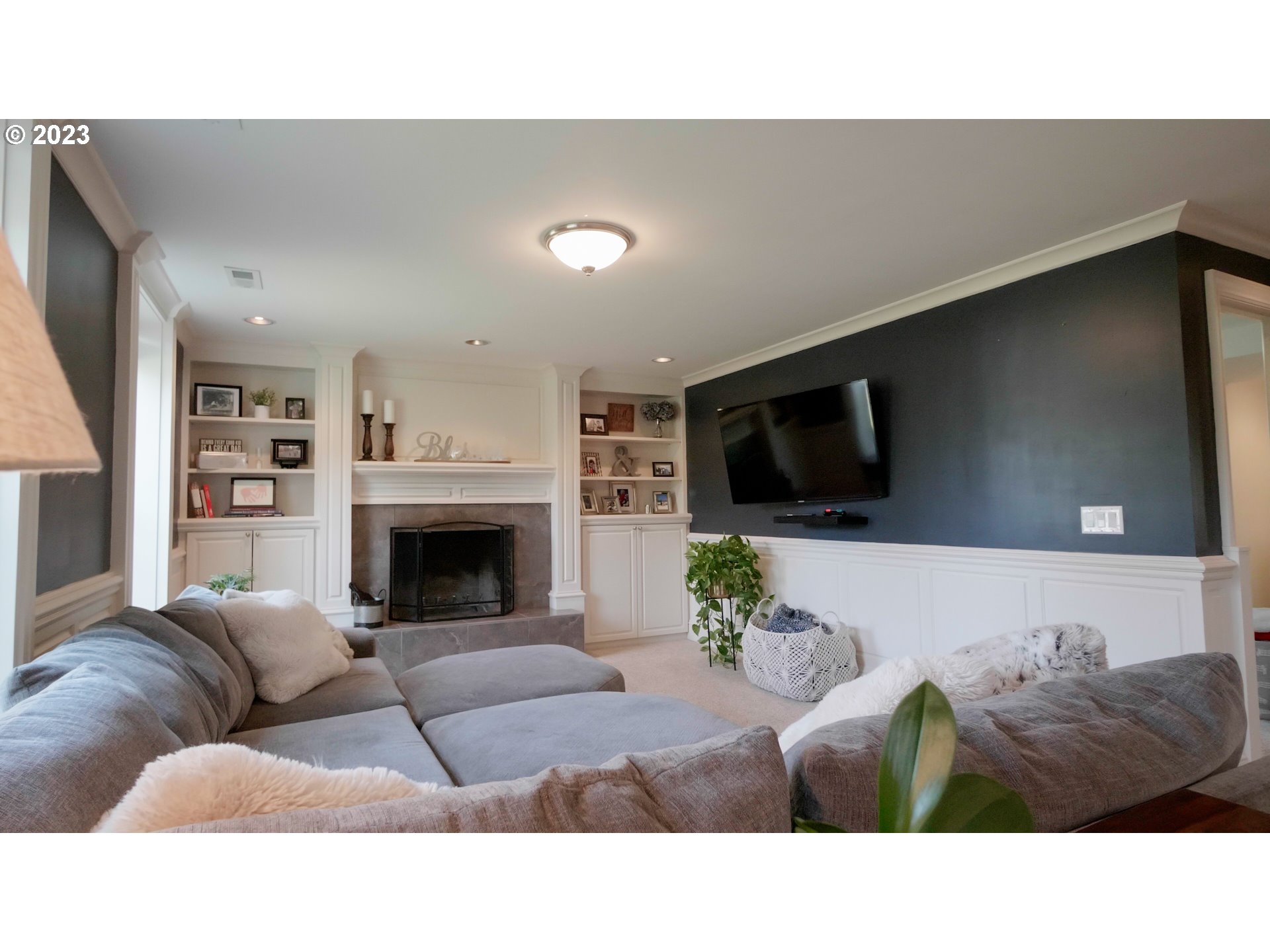 14976 South Hoffman Road Oregon City, OR 97045 - Photo 15 of 26 a living room with furniture and a fireplace