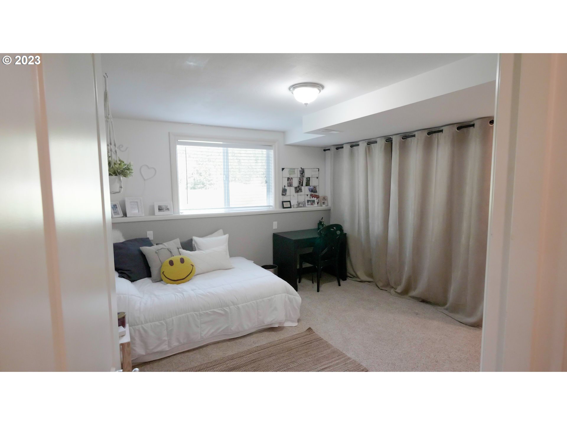 14976 South Hoffman Road Oregon City, OR 97045 - Photo 24 of 26 a room with a bed and a cabinets