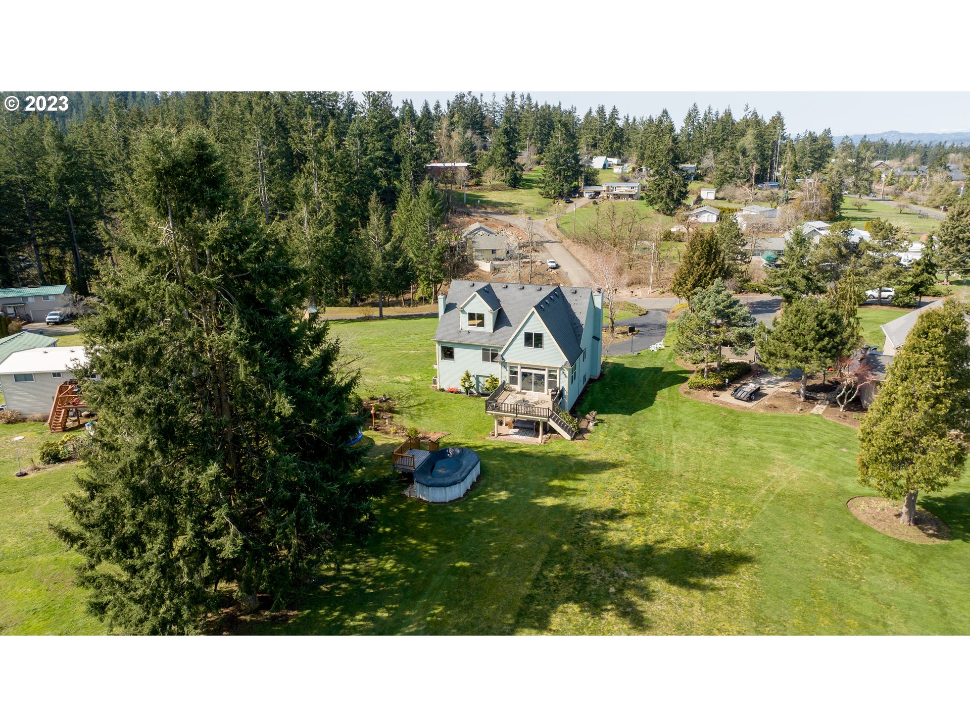 14976 South Hoffman Road Oregon City, OR 97045 - Photo 3 of 26 a open area with trees in the background