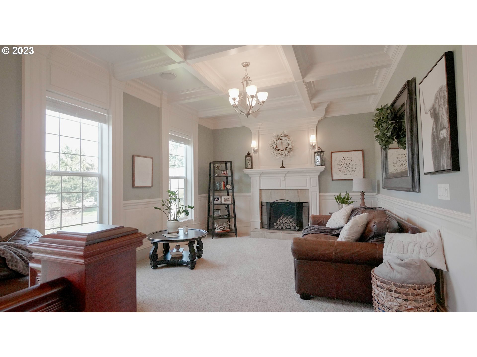 14976 South Hoffman Road Oregon City, OR 97045 - Photo 5 of 26 a living room with furniture a fireplace and a window