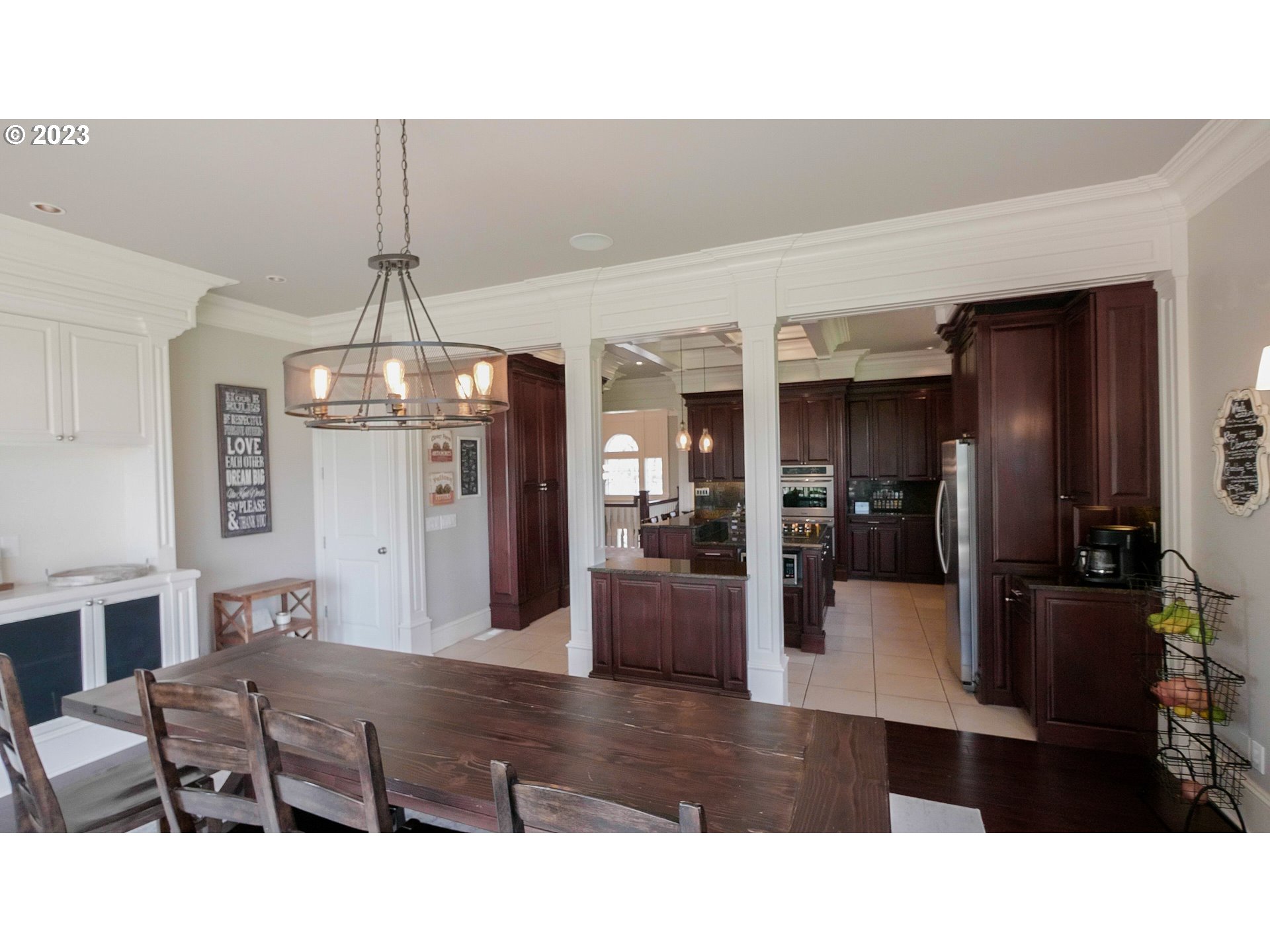 14976 South Hoffman Road Oregon City, OR 97045 - Photo 9 of 26 a living room with stainless steel appliances kitchen island granite countertop furniture
