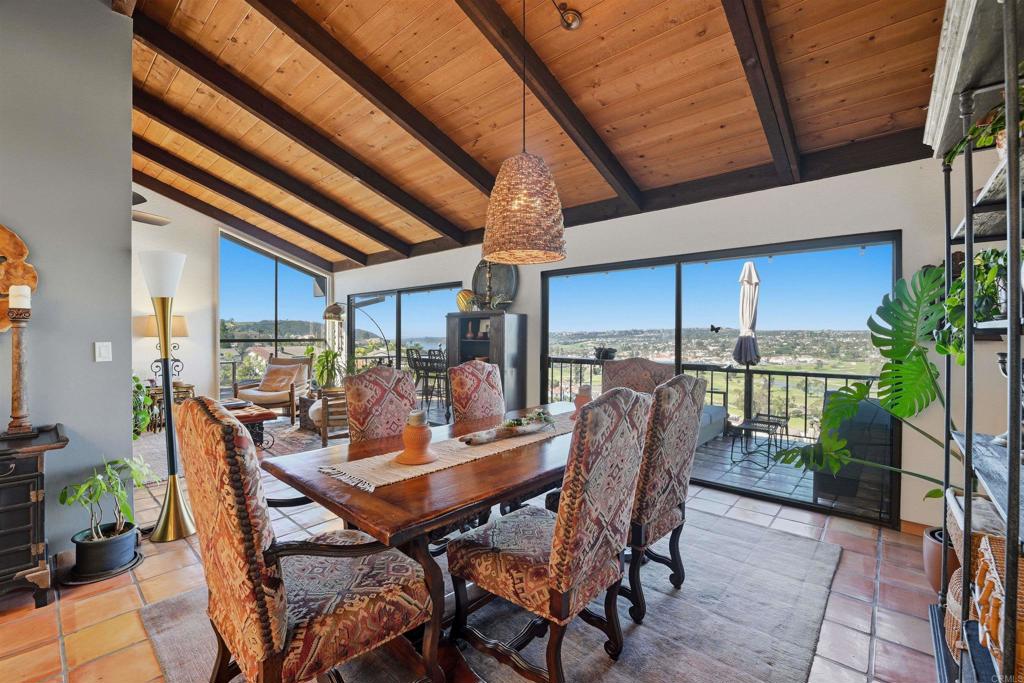 2414 Sacada Circle Carlsbad, CA 92009 - Photo 12 of 56 a dining room with furniture and wooden floor