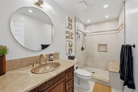 a bed room with furniture and a fireplace