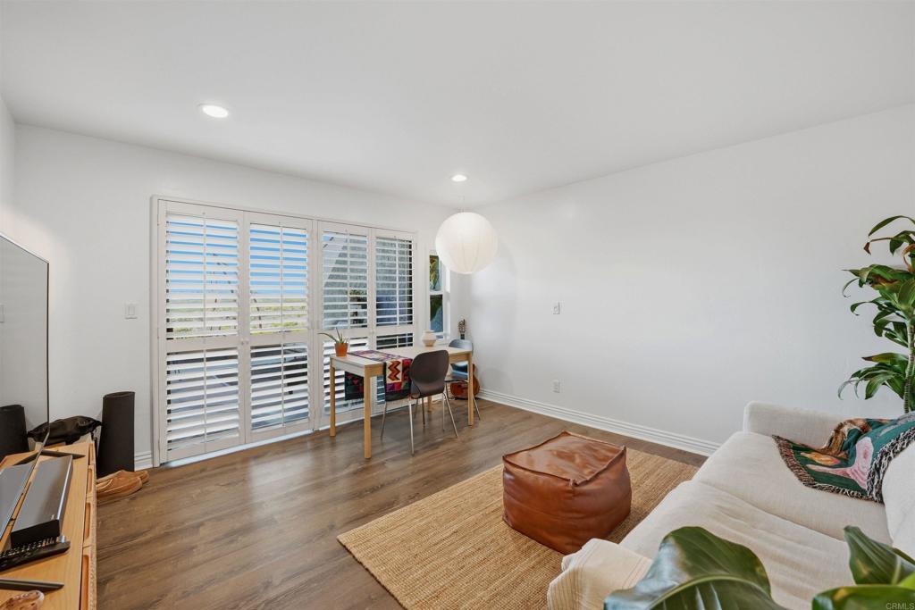 2414 Sacada Circle Carlsbad, CA 92009 - Photo 27 of 56 a living room with furniture and wooden floor