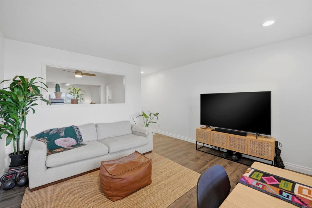 2414 Sacada Circle Carlsbad, CA 92009 - Photo 28 of 56 a living room with furniture and a flat screen tv