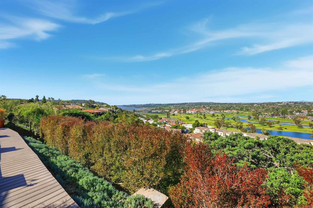 2414 Sacada Circle Carlsbad, CA 92009 - Photo 34 of 56 a view of a lake with a city