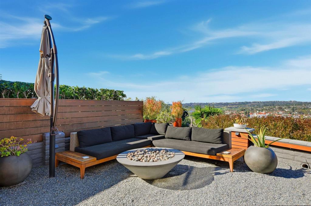 2414 Sacada Circle Carlsbad, CA 92009 - Photo 37 of 56 a outdoor living space with furniture and city view