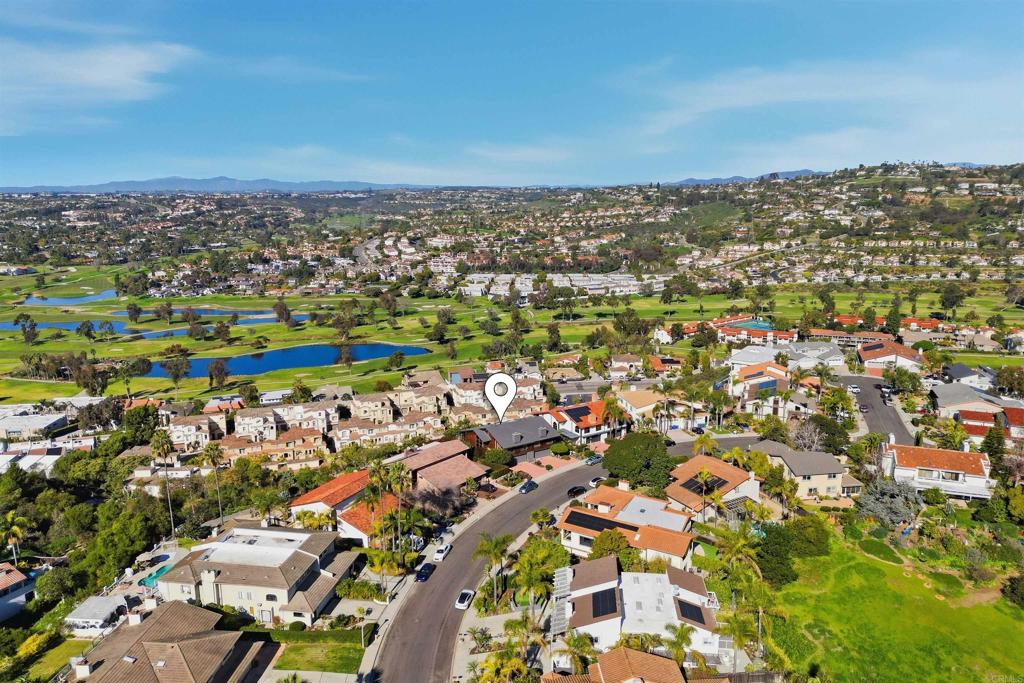 2414 Sacada Circle Carlsbad, CA 92009 - Photo 48 of 56 an aerial view of a city with lots of residential buildings
