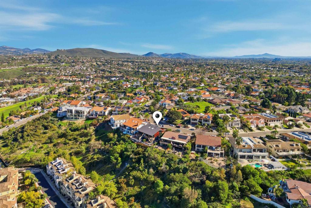 2414 Sacada Circle Carlsbad, CA 92009 - Photo 49 of 56 an aerial view of residential houses with outdoor space and trees