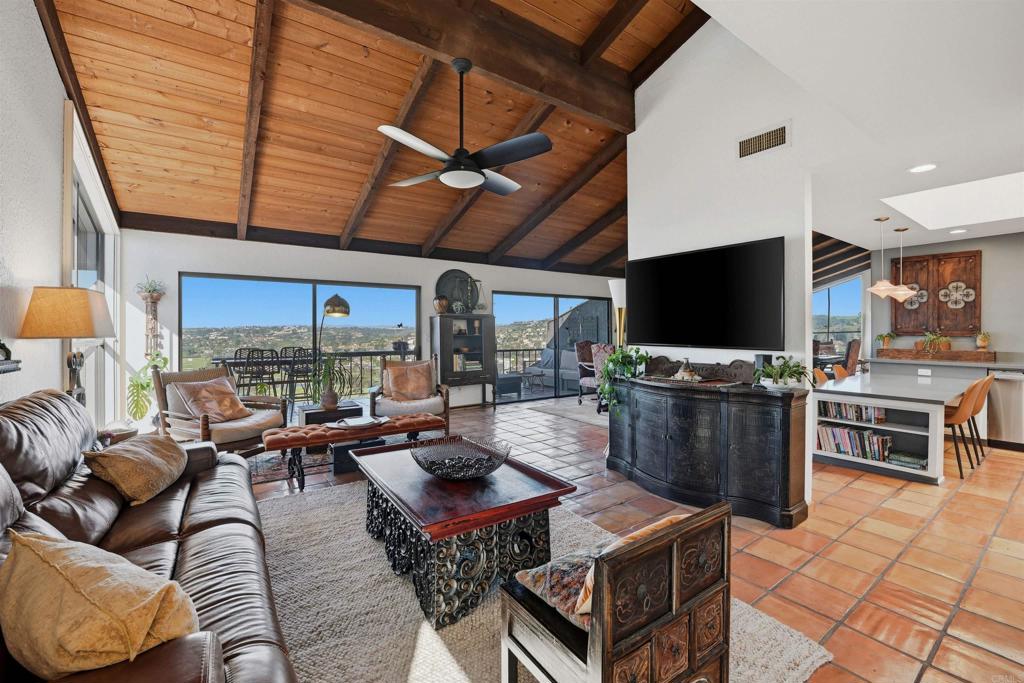2414 Sacada Circle Carlsbad, CA 92009 - Photo 6 of 56 a living room with furniture and a flat screen tv
