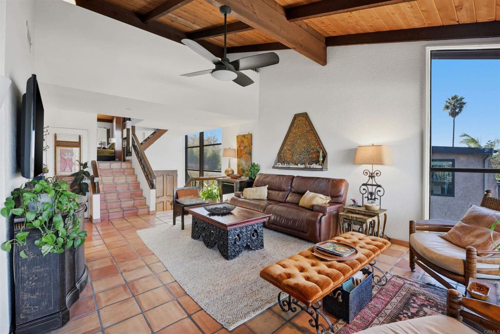 2414 Sacada Circle Carlsbad, CA 92009 - Photo 8 of 56 a living room with furniture and a flat screen tv