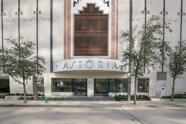 a view of a building and a street