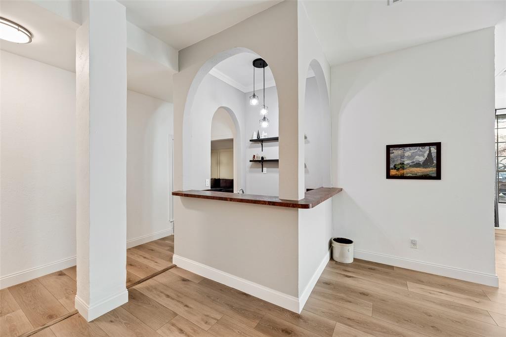 740 Newport Road Fort Worth, TX 76120 - Photo 4 of 38 a kitchen with granite countertop a stove and a sink