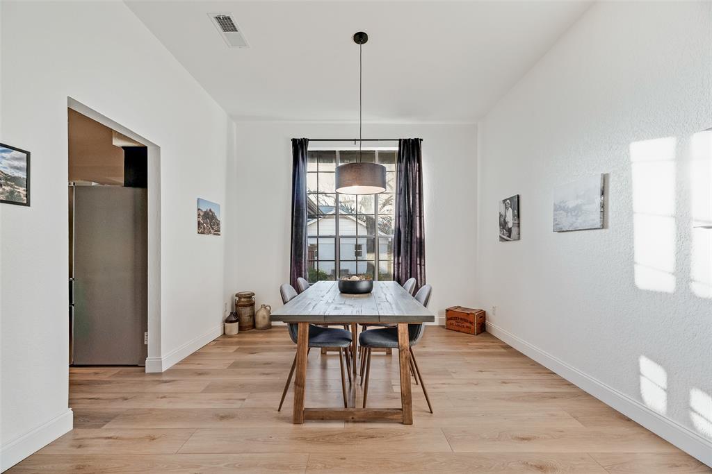 740 Newport Road Fort Worth, TX 76120 - Photo 8 of 38 a view of a room with furniture window and wooden floor