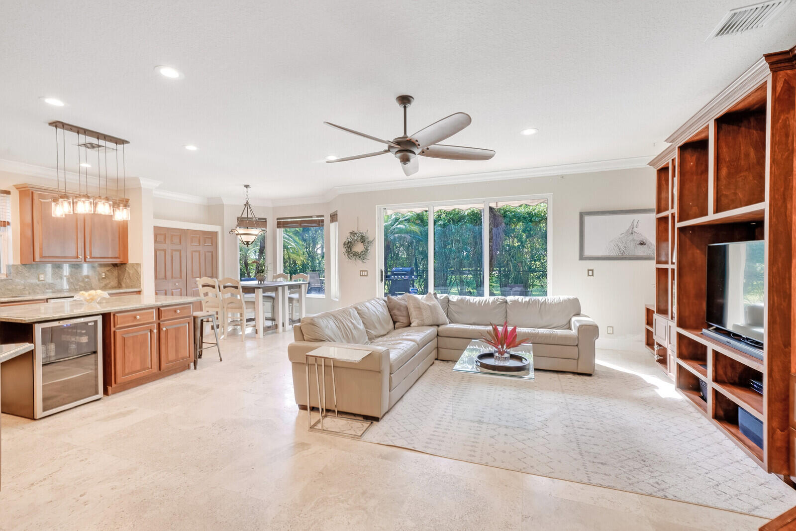 202 Anhinga Lane Jupiter, FL 33458 - Photo 17 of 40 a living room with furniture fireplace and flat screen tv