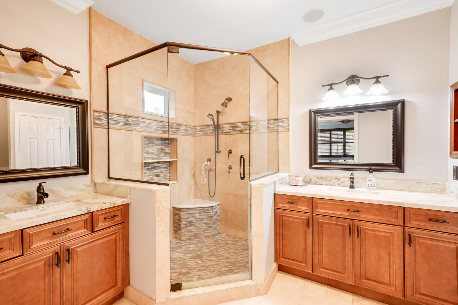 202 Anhinga Lane Jupiter, FL 33458 - Photo 22 of 40 a bathroom with a granite countertop sink mirror and