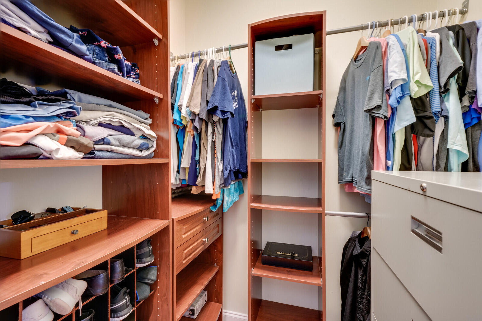 202 Anhinga Lane Jupiter, FL 33458 - Photo 24 of 40 a view of walk in closet with clothes and shoes