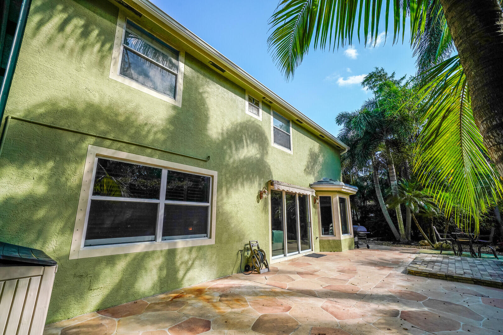 202 Anhinga Lane Jupiter, FL 33458 - Photo 37 of 40 a view of a house with a yard