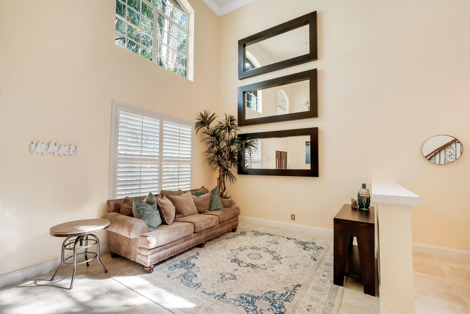 202 Anhinga Lane Jupiter, FL 33458 - Photo 7 of 40 a living room with furniture and a window