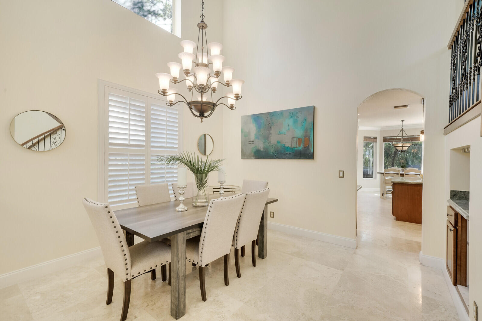 202 Anhinga Lane Jupiter, FL 33458 - Photo 9 of 40 a view of a dining room with furniture and chandelier