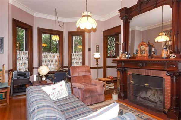 42 Rangeley Road Winchester, MA 01890 - Photo 11 of 30 a living room with furniture a large window and a fireplace