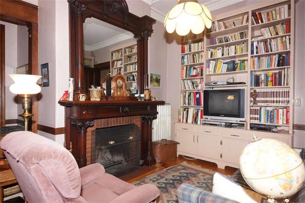 42 Rangeley Road Winchester, MA 01890 - Photo 12 of 30 a living room with a fireplace furniture and a flat screen tv