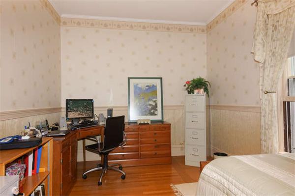 42 Rangeley Road Winchester, MA 01890 - Photo 19 of 30 a bedroom with furniture and a wooden floor