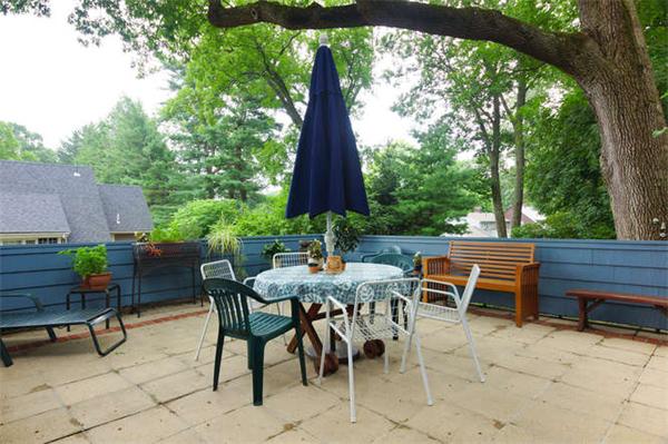42 Rangeley Road Winchester, MA 01890 - Photo 27 of 30 a view of a tables and chairs in patio