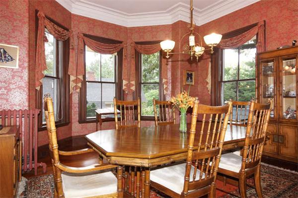 42 Rangeley Road Winchester, MA 01890 - Photo 5 of 30 a dining room with furniture a chandelier and fireplace