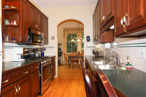 42 Rangeley Road Winchester, MA 01890 - Photo 8 of 30 a kitchen with lots of counter top space and wooden floor