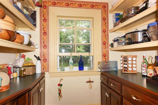 42 Rangeley Road Winchester, MA 01890 - Photo 9 of 30 a kitchen with a window a sink and cabinets