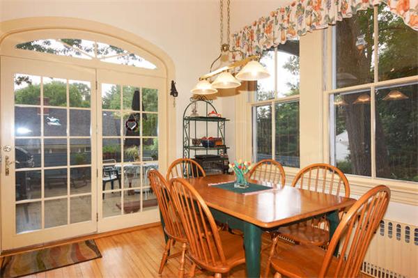 42 Rangeley Road Winchester, MA 01890 - Photo 10 of 30 a dining room with furniture a chandelier and wooden floor