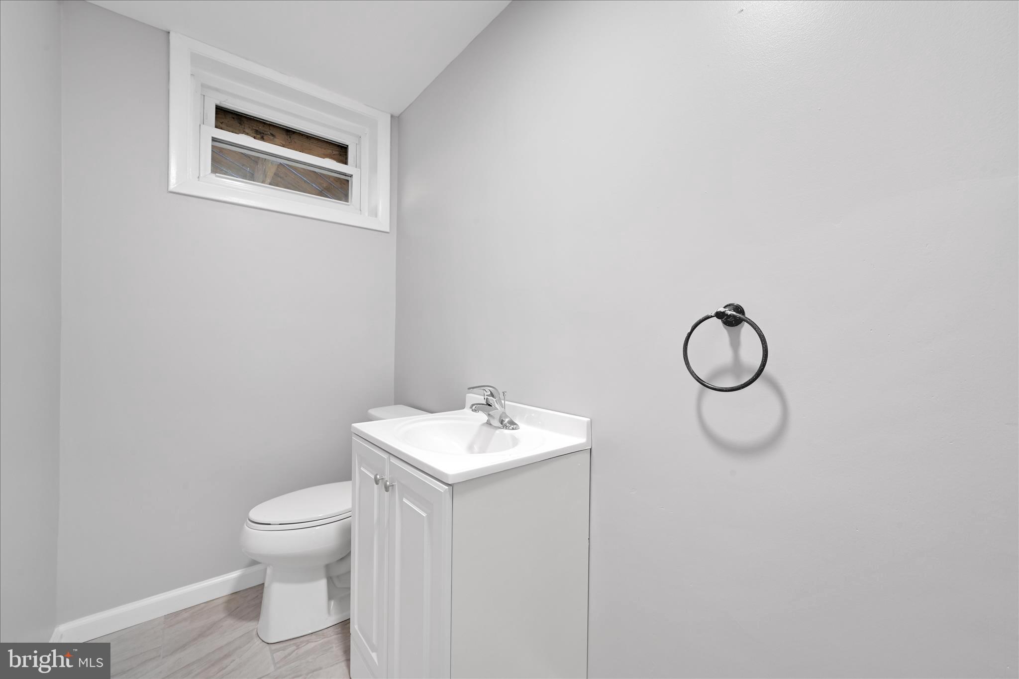 2509 Mill Road Mechanicsburg, PA 17055 - Photo 28 of 43 a bathroom with a toilet sink and mirror