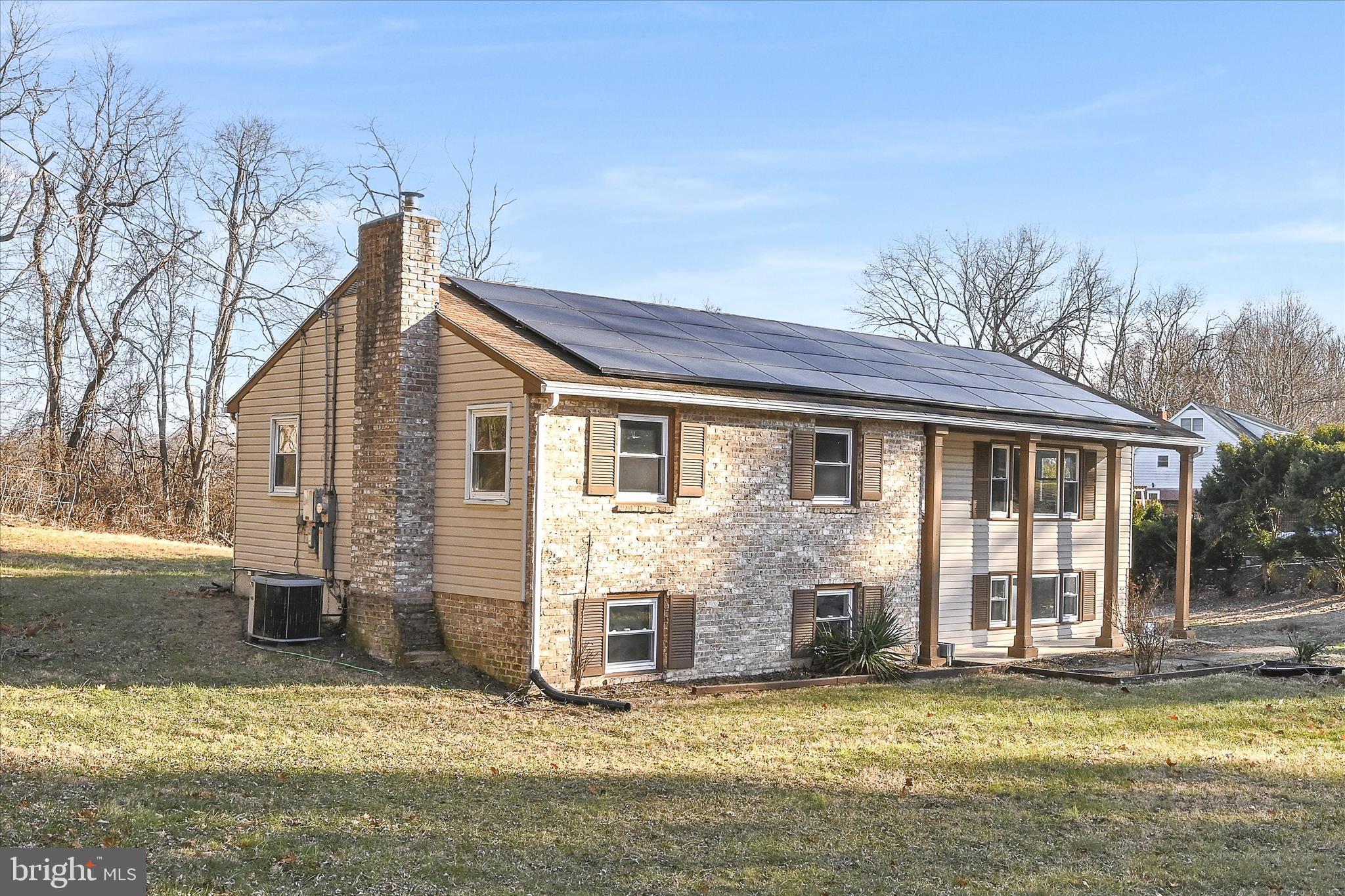 2509 Mill Road Mechanicsburg, PA 17055 - Photo 32 of 43 a view of a house with a yard and sitting area