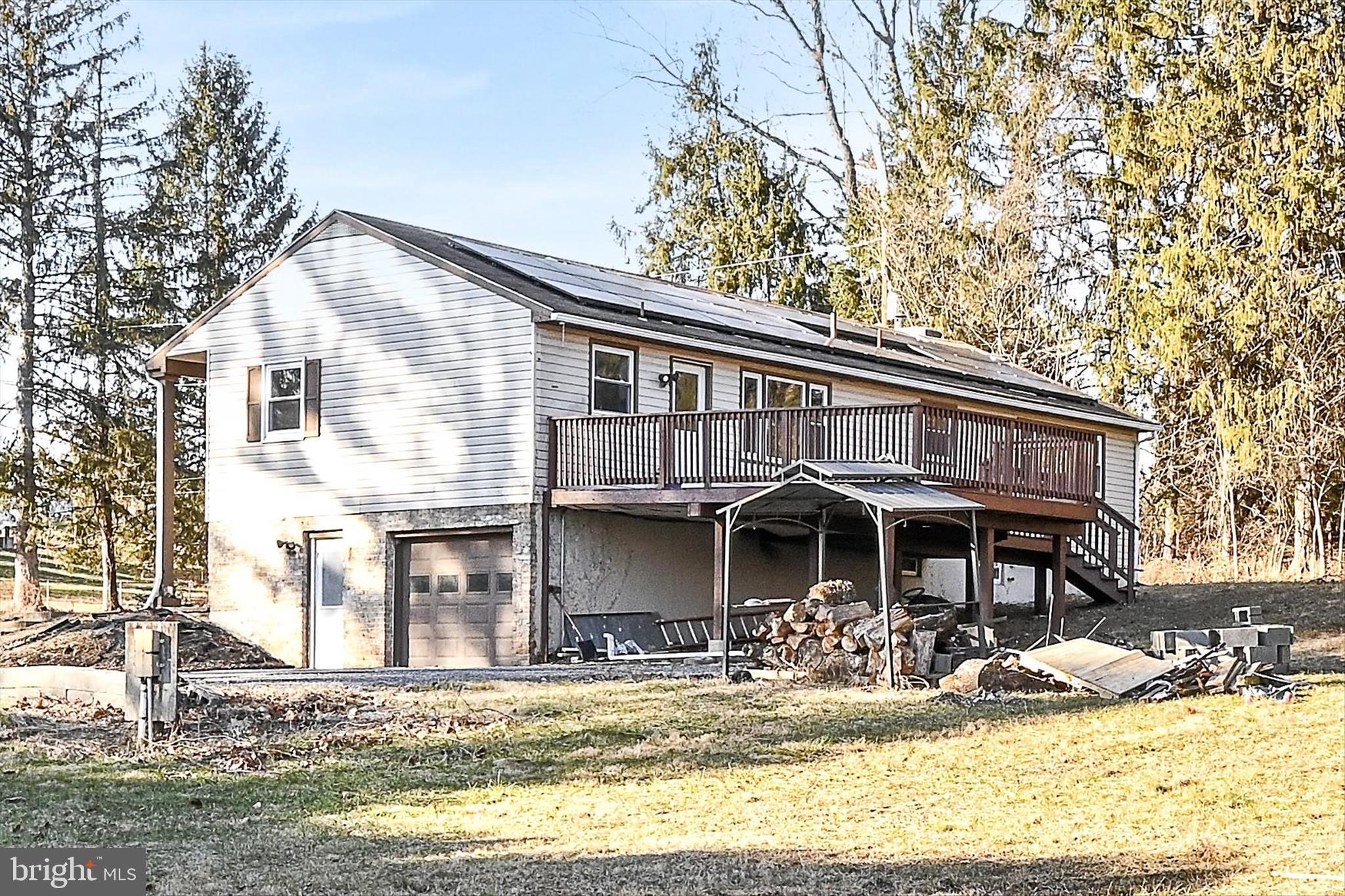 2509 Mill Road Mechanicsburg, PA 17055 - Photo 35 of 43 a front view of a house with swimming pool