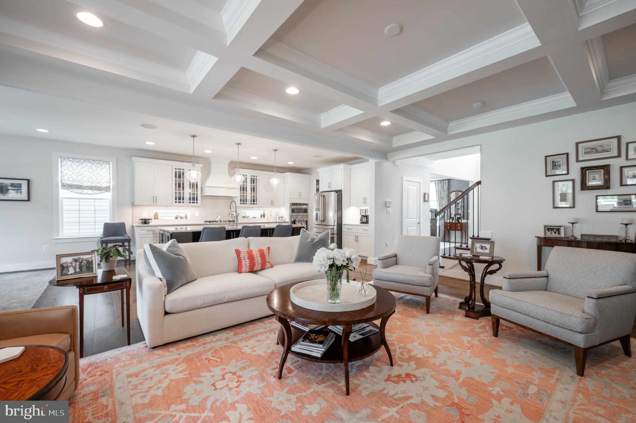 6233 McConnell Lane Springfield, VA 22152 - Photo 15 of 58 a living room with furniture kitchen view and a dining table