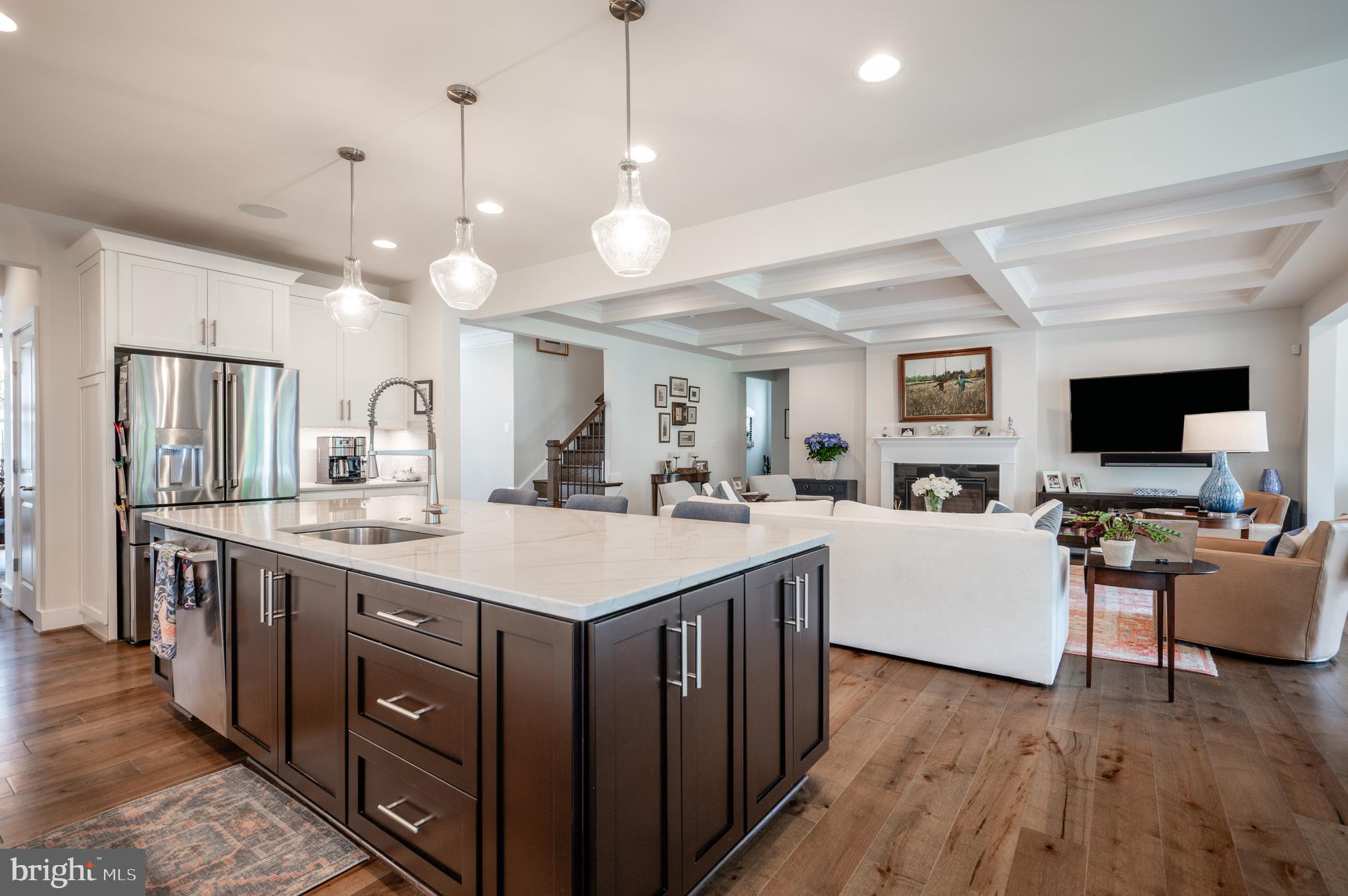 6233 McConnell Lane Springfield, VA 22152 - Photo 18 of 58 a large kitchen with cabinets a sink a counter space and stainless steel appliances