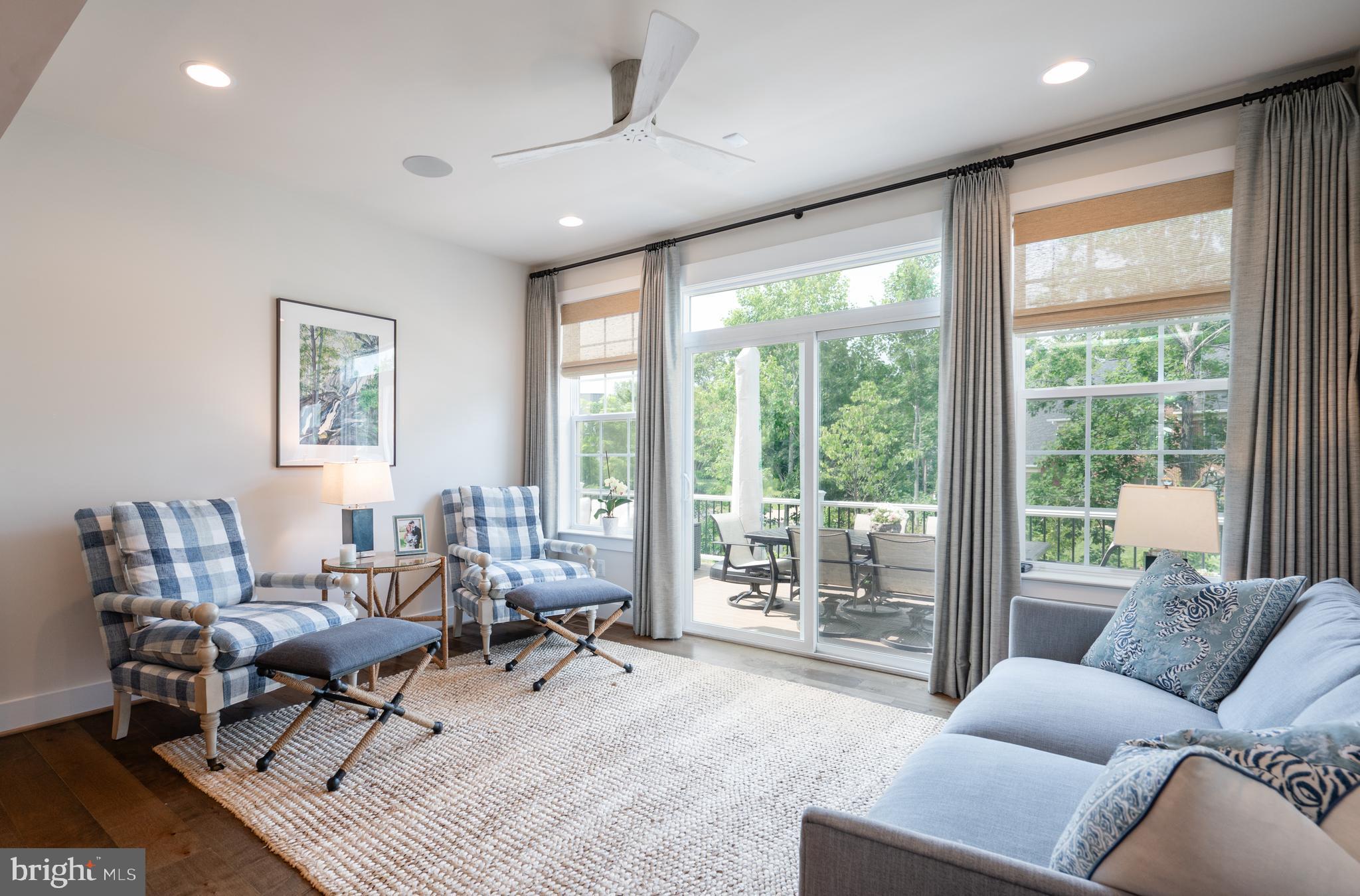 6233 McConnell Lane Springfield, VA 22152 - Photo 22 of 58 a living room with furniture and large windows