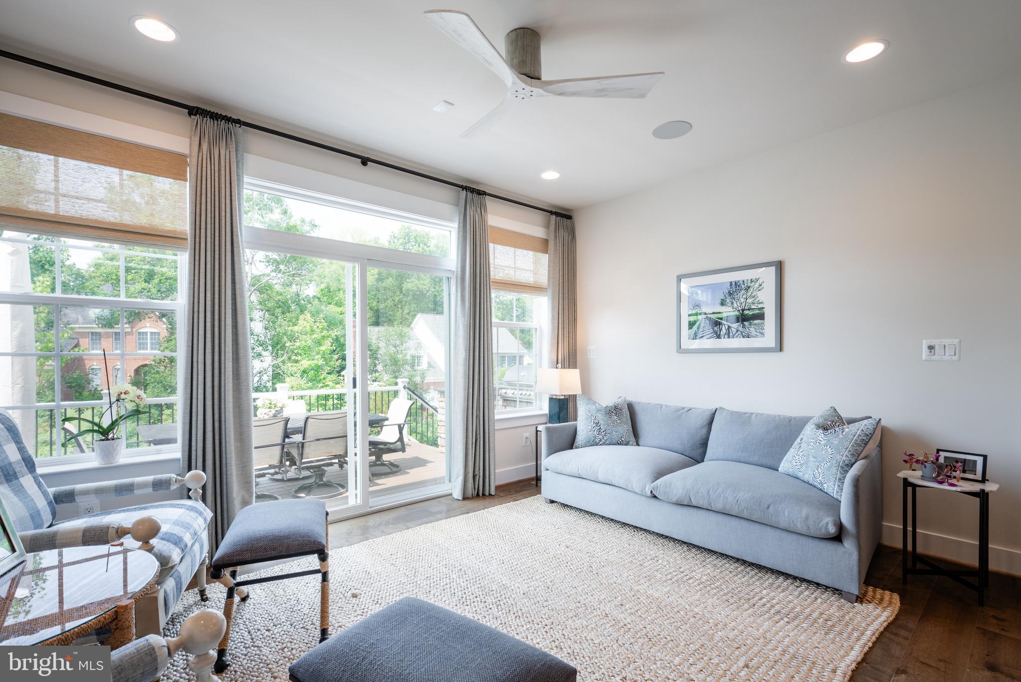 6233 McConnell Lane Springfield, VA 22152 - Photo 23 of 58 a living room with furniture and a large window