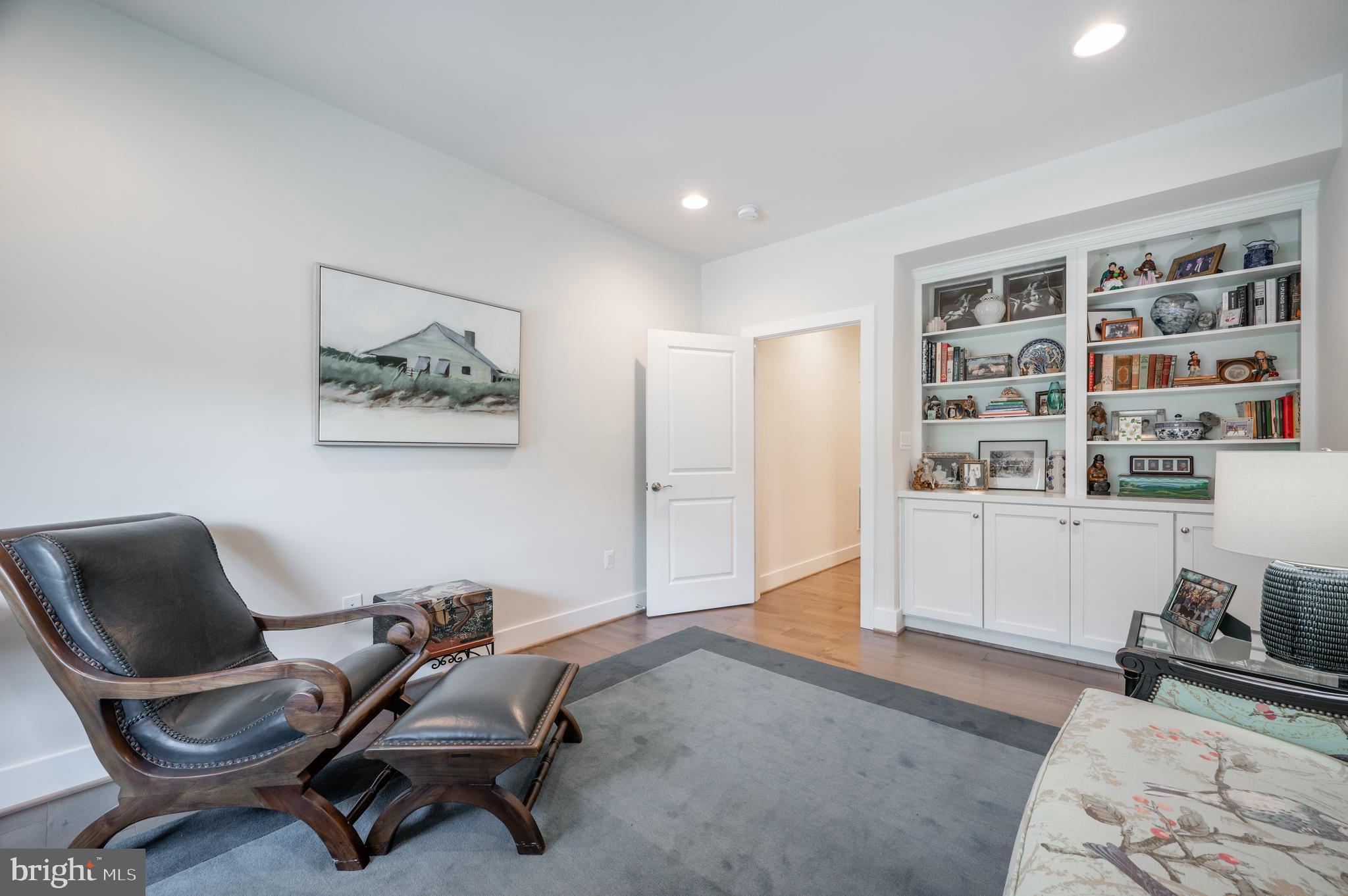 6233 McConnell Lane Springfield, VA 22152 - Photo 26 of 58 a view of a livingroom with workspace and a couch