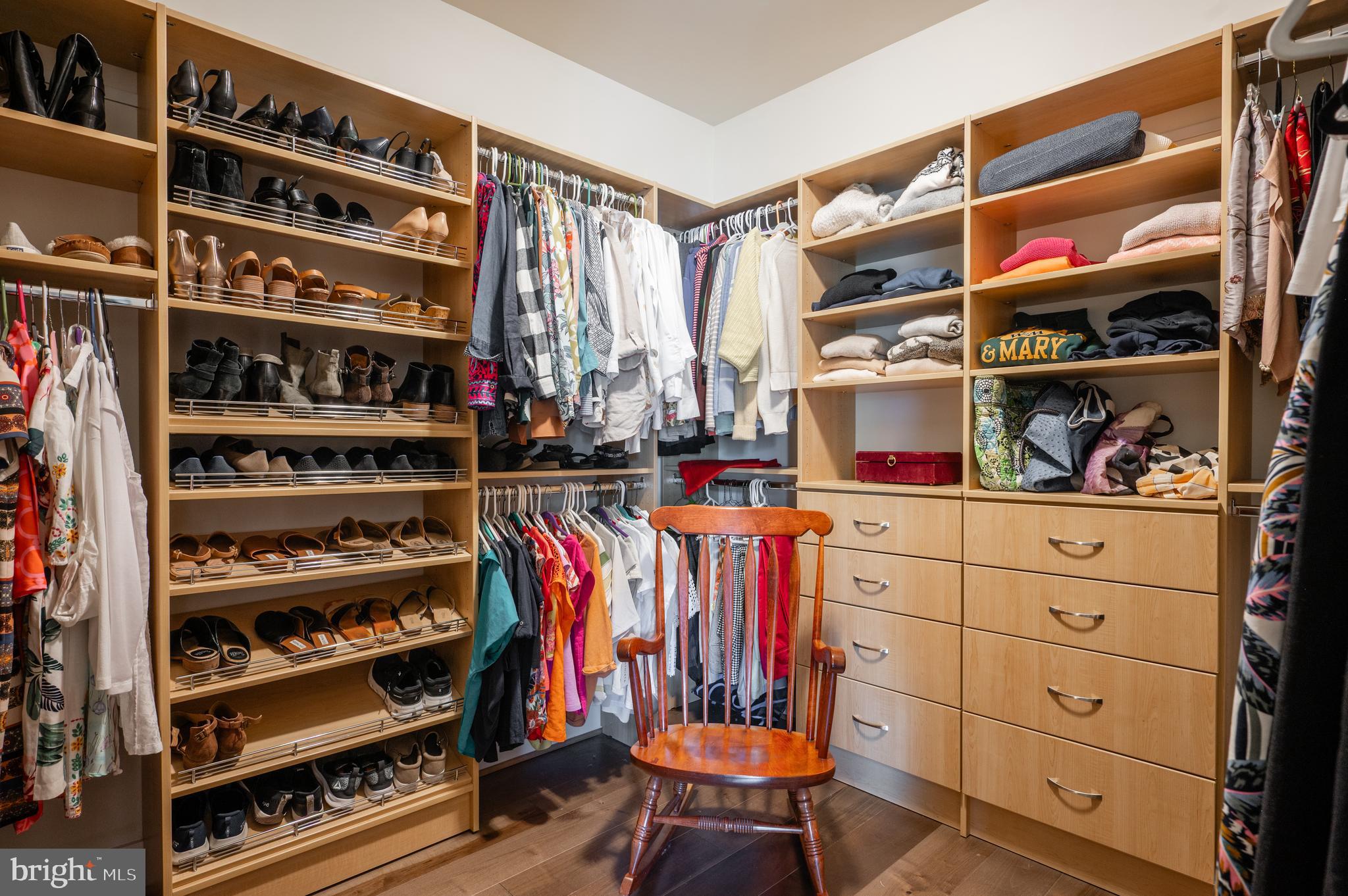 6233 McConnell Lane Springfield, VA 22152 - Photo 33 of 58 a view of walk in closet with clothes and shoes