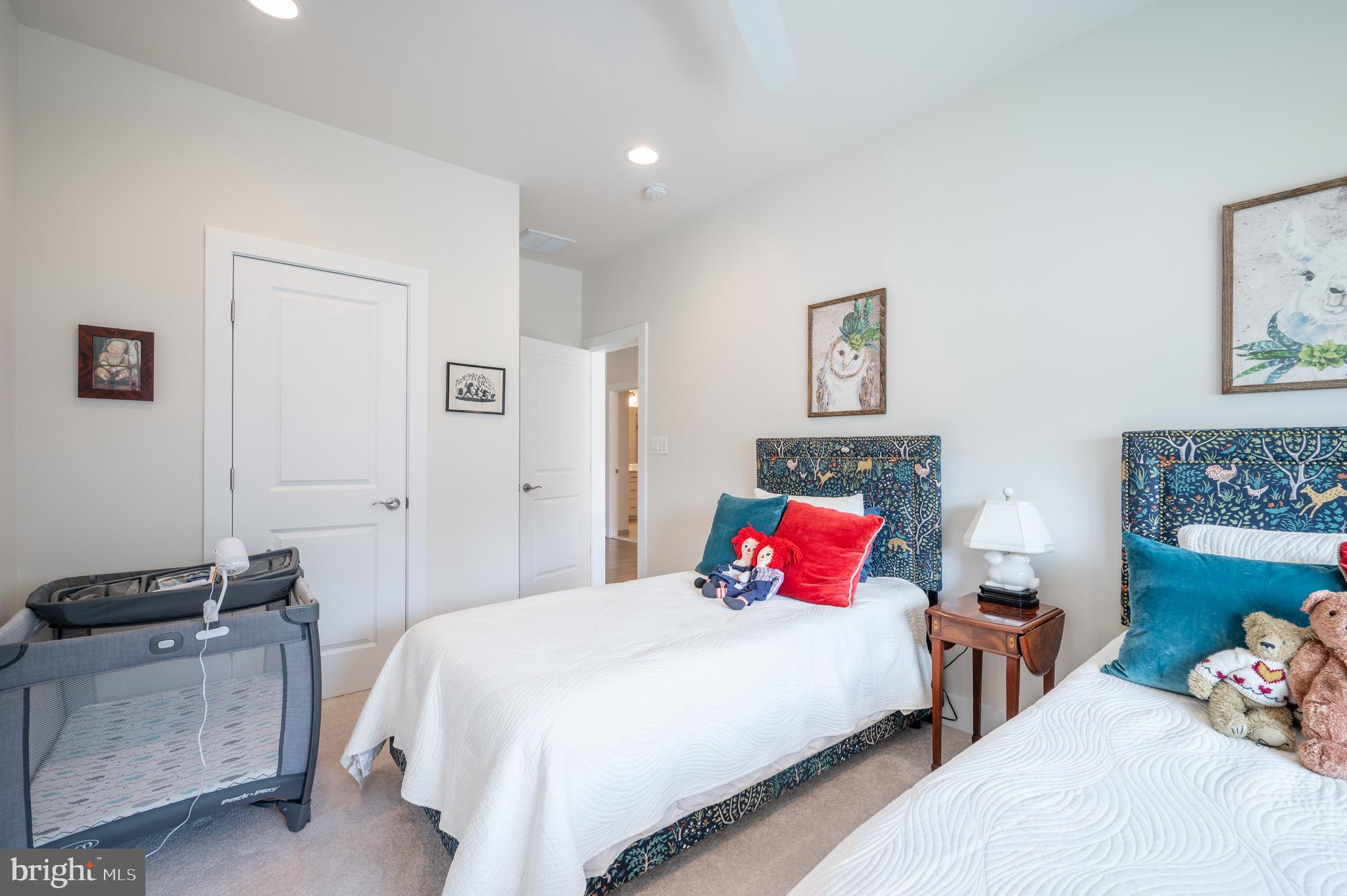 6233 McConnell Lane Springfield, VA 22152 - Photo 37 of 58 a bedroom with a bed and a couch