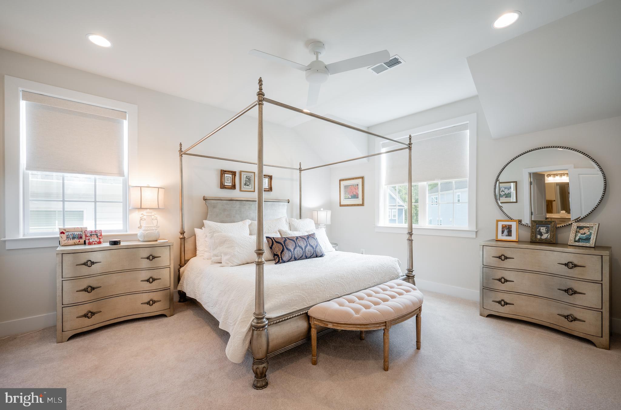 6233 McConnell Lane Springfield, VA 22152 - Photo 39 of 58 a bedroom with a bed and a dresser