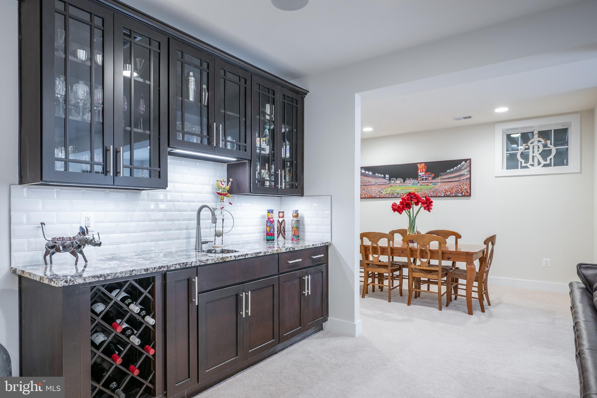 6233 McConnell Lane Springfield, VA 22152 - Photo 49 of 58 a kitchen with granite countertop a sink cabinets and window