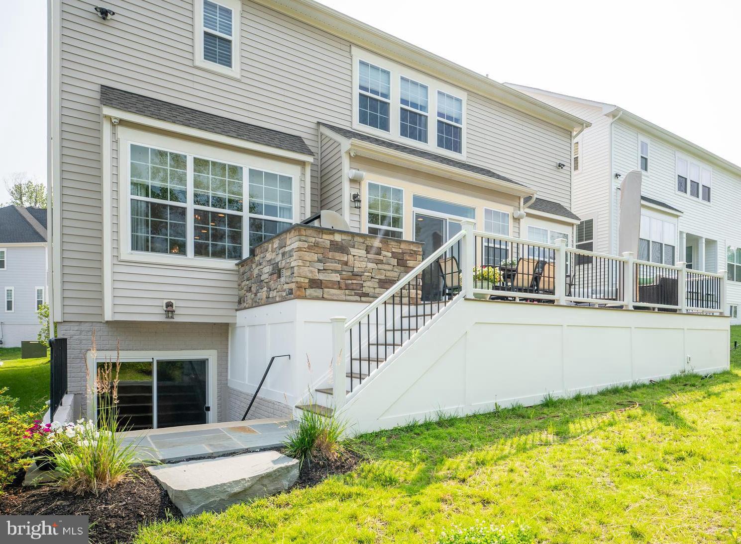 6233 McConnell Lane Springfield, VA 22152 - Photo 55 of 58 a front view of a house with a yard