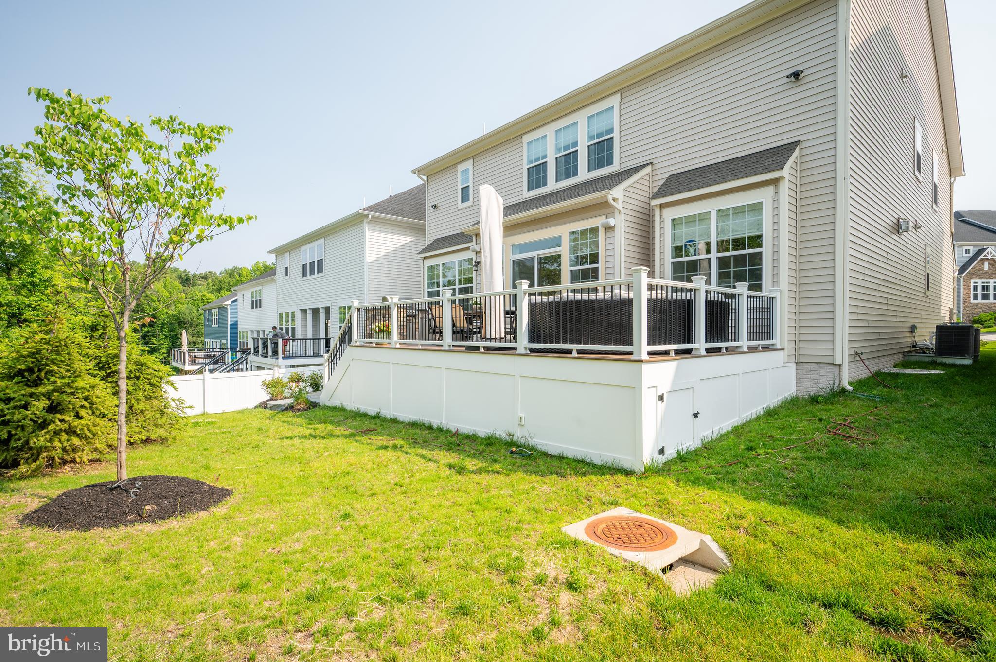6233 McConnell Lane Springfield, VA 22152 - Photo 8 of 58 a view of an house with swimming pool and porch